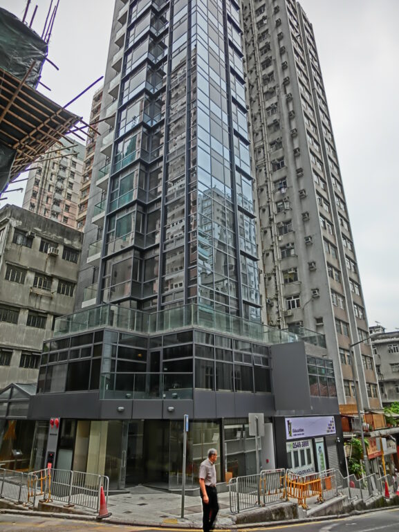 Modern apartment building representing property rentals