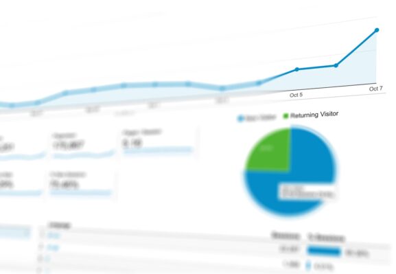 An abstract visualization of data analytics with graphs and charts showing growth trends