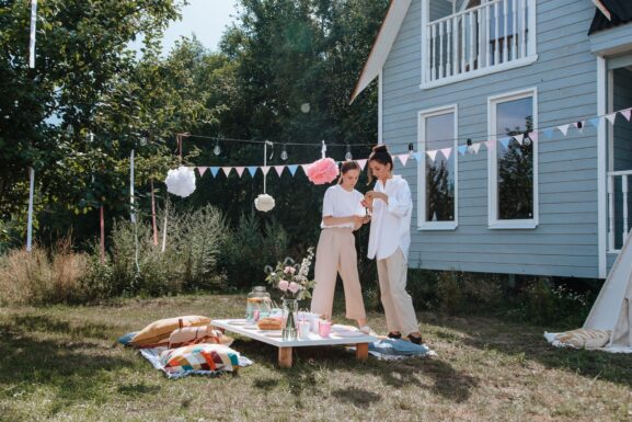 women decorating the backyard