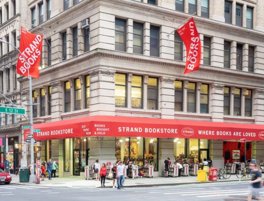 Strand Bookstore exterior with red banners at Broadway and East 12th Street, New York City